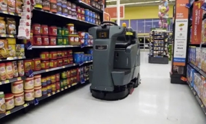 Một máy lau sàn tự động của Brain Corp., được gọi là Auto-C, giúp làm sạch lối đi tại các cửa hàng Walmart. Nguồn: Walmart