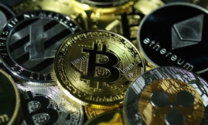 Binance và Coinbase vừa bị SEC đâm đơn kiện với một loạt cáo buộc - Ảnh: Getty Images