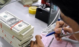 Giá USD xuống nhanh trước thềm cơ chế mới