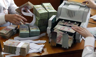 Ngân hàng phải chi thêm tiền để xử lý nợ xấu