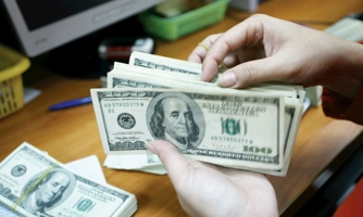 Đi ngược xu thế khu vực, VND lên giá so với USD