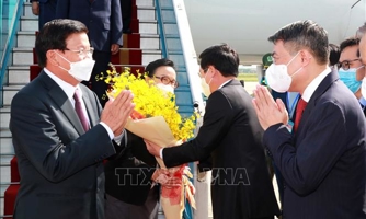 Tổng Bí thư, Chủ tịch Lào đến Hà Nội, bắt đầu thăm hữu nghị chính thức Việt Nam