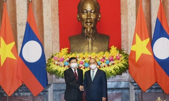 Việt Nam - Lào tiếp tục phát huy truyền thống "hạt gạo cắn đôi, cọng rau bẻ nửa"