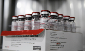WHO bắt đầu phân phối vaccine Trung Quốc, dự kiến giao 100 triệu liều trong 1 tháng