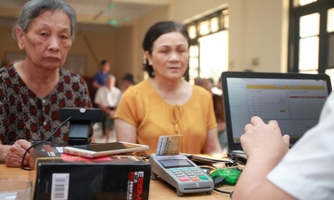Phấn đấu 100% người hưởng trợ cấp xã hội nhận qua tài khoản 