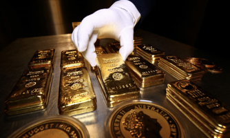 Giá vàng tăng vì đồng USD quay đầu giảm, SPDR Gold Trust bán ròng hơn 6 tấn vàng tuần này