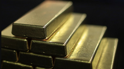 Giá vàng bị ghìm dưới mốc 3.300 USD/oz vì USD tiếp tục mạnh lên