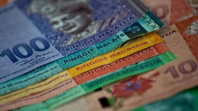 Tiền Malaysia mất giá kỷ lục trong 17 năm