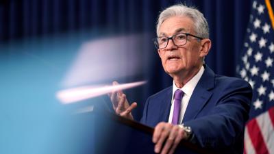 Fed lo lạm phát chững lại nhưng ông Powell nói không tăng thêm lãi suất