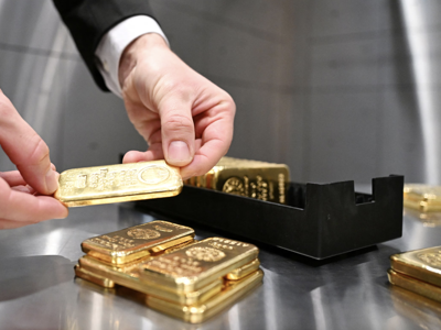 Giá vàng xuống đáy 3 tuần vì USD tăng mạnh