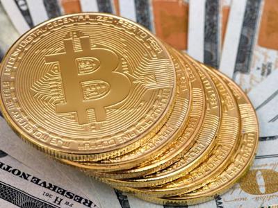 Đà tăng quá mạnh, Bitcoin phá tiếp mốc 22.000 USD