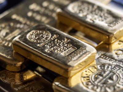 Giá vàng giằng co dưới sức ép của đồng USD mạnh lên