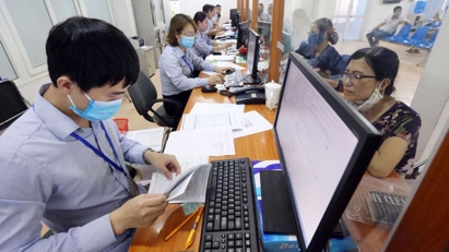 Hanoi cuts insurance premium for workers