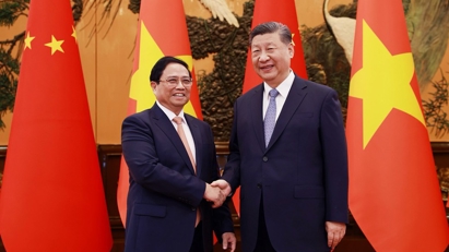 China supports enterprises to enhance investment in Vientam: Chinese top leader