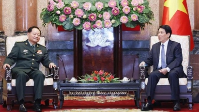 State President hosts a reception for Vice Chairman of China's Central Military Commission
