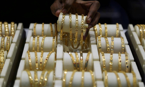 Giá vàng tiếp tục tăng, USD tự do sụt thêm