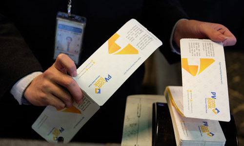 Cái bắt tay giữa PVcomBank với Vietnam Airlines