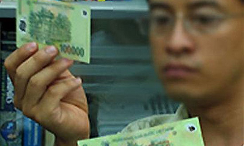 Lượng tiền giả bị thu giữ tiếp tục giảm mạnh