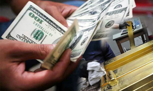 Giá vàng, USD bật tăng sau quyết định điều chỉnh tỷ giá