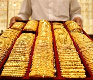 Giá vàng trong nước tăng, thế giới giảm