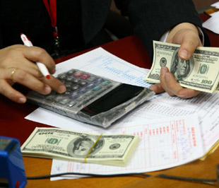 Nới rộng biên độ tỷ giá lên +/-5%