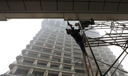 Áp giá trần, thử nghiệm hạ sốt bất động sản của Trung Quốc