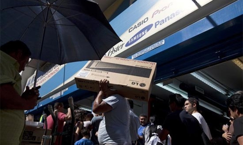 Phá giá đồng tiền, Venezuela đối mặt nhiều rắc rối mới