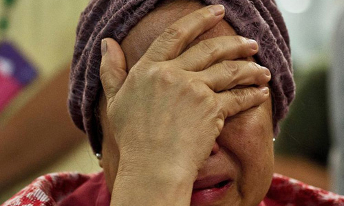 Thân nhân hành khách MH17 đón tin dữ