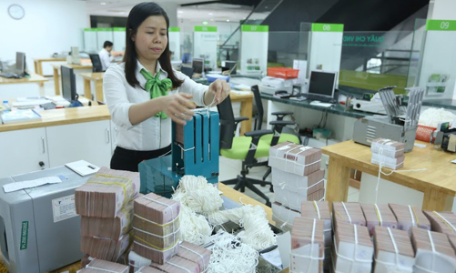 Tín dụng tăng nhanh, thanh khoản hệ thống vẫn dồi dào