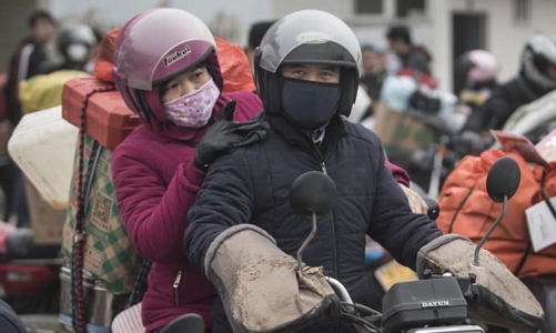 Di cư ngược ở Trung Quốc: Lao động từ nông thôn ồ ạt bỏ phố về quê