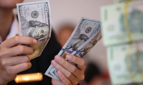 Phập phồng tỷ giá sau khi FED tăng lãi suất vào năm tới