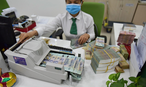 Có nên cấm ngân hàng cho vay góp vốn, hợp tác đầu tư?