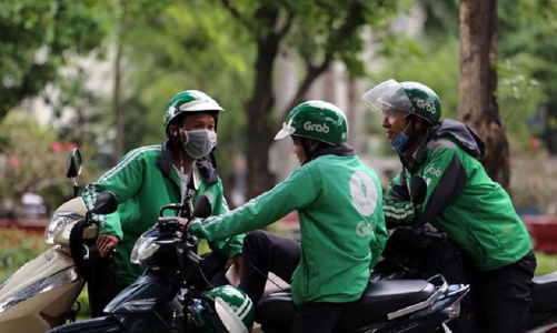 Grab thu “phụ phí nắng nóng”, tài xế có được hưởng?