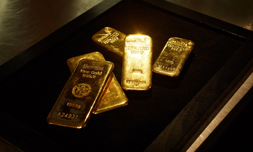 Giá vàng tăng nhẹ khi đồng USD tụt mạnh, SPDR Gold Trust bất ngờ mua ròng