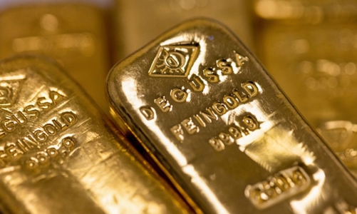 Vàng lại giảm giá vì phát biểu của quan chức Fed, SPDR Gold Trust bán ròng