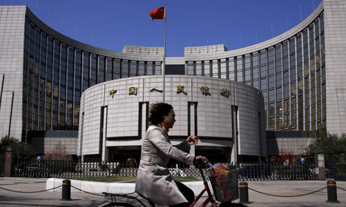 Nhà đầu tư Trung Quốc xả mạnh cổ phiếu và trái phiếu Mỹ