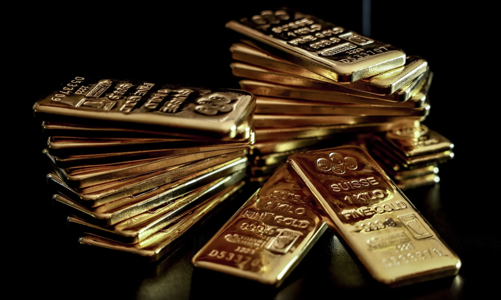 Giá vàng lập kỷ lục rồi suy yếu sau tuyên bố lãi suất từ Fed
