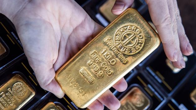 Giá vàng tăng vọt, đồng USD tụt giá sau cuộc họp Fed