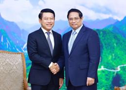 PM Pham Minh Chinh receives Lao Deputy PM and Foreign Minister