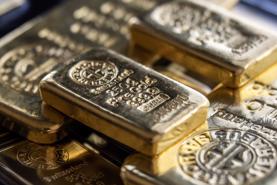 Giá vàng giằng co dưới sức ép của đồng USD mạnh lên