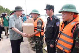 Leaders visit typhoon-hit localities to guide measures to overcome aftermaths