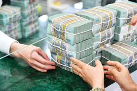 Ngân hàng Nhà nước bơm ròng nhẹ, lãi suất tín phiếu tiếp tục giảm