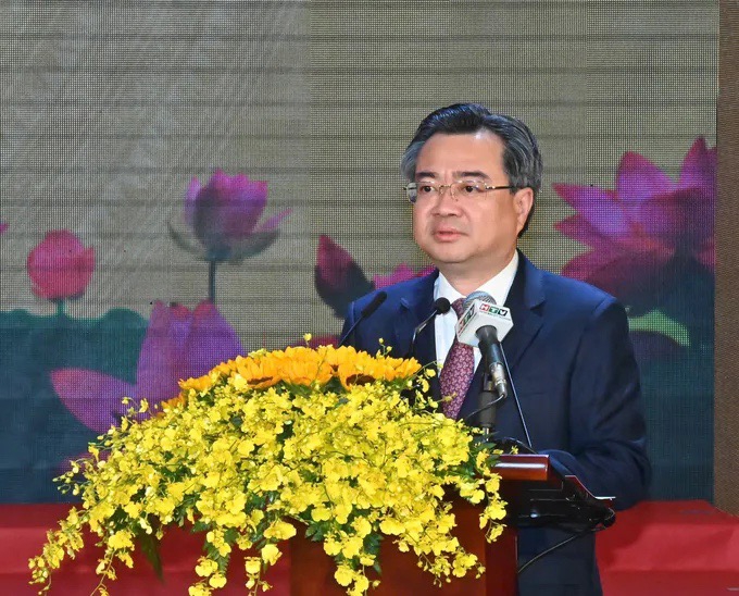 Ph&oacute; B&iacute; thư Thường trực Th&agrave;nh ủy Th&agrave;nh phố Hồ Ch&iacute; Minh Nguyễn Thanh Nghị c&ocirc;ng bố c&aacute;c Nghị quyết, Quyết định của Th&agrave;nh phố s&aacute;ng 30/6. Ảnh: Việt Dũng/SGGP.