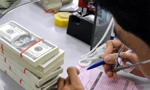 Giá USD xuống nhanh trước thềm cơ chế mới