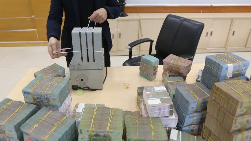 Một mặt nguồn giải ngân đầu tư công vẫn chậm và hạn chế, nhưng mặt khác lại tạo điều kiện góp phần cân đối thanh khoản và lãi suất hệ thống ngân hàng - Ảnh: Quang Phúc.