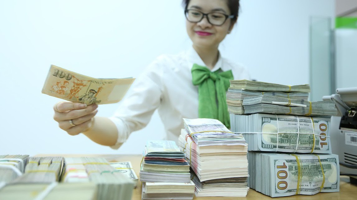Tỷ giá USD/VND dự báo nửa đầu năm nay chỉ biến động quanh 0,5% so với cuối 2017 - Ảnh: Quang Phúc.