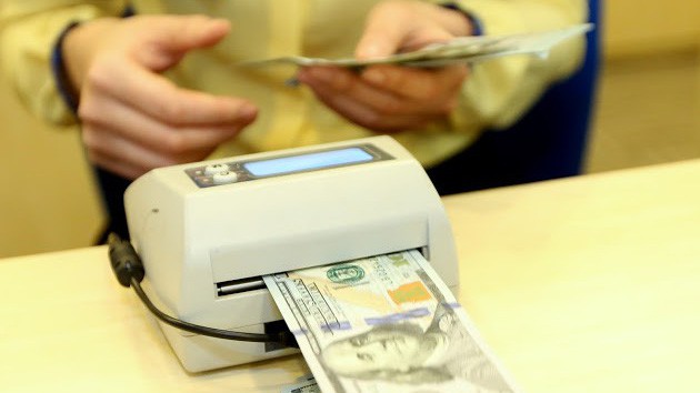 Lượng Ngân hàng Nhà nước bán ra trong hai phiên vừa qua không lớn, nhưng đánh dấu sự can thiệp chính thức vào cung - cầu trên thị trường - Ảnh: Quang Phúc.