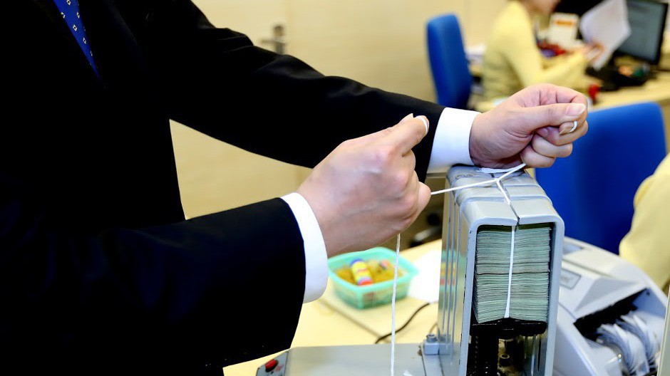 Trong phiên giao dịch đầu tuần này (30/7), Ngân hàng Nhà nước tăng mạnh mức chào thầu tín phiếu để hút bớt tiền về, lên tới 32.000 tỷ đồng - quy mô lớn hiếm có trong khuôn khổ một phiên trong những năm qua cho đến nay - Ảnh: Quang Phúc.