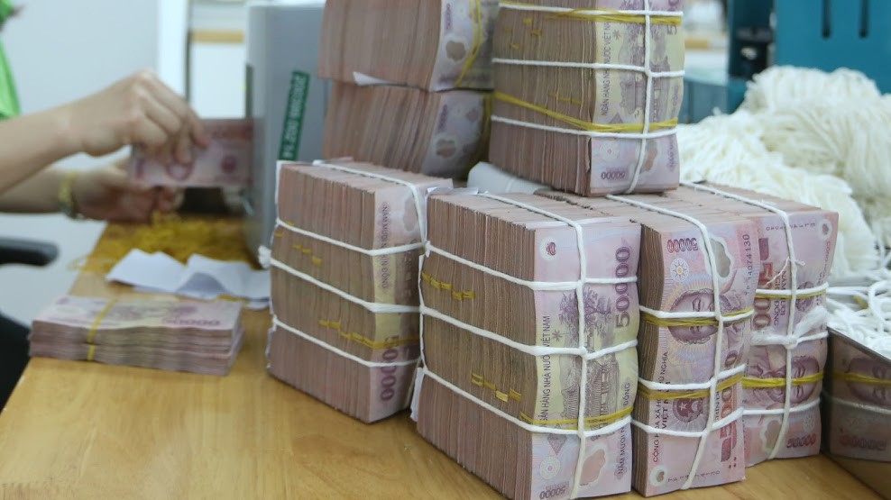 Ngân hàng Nhà nước đã bơm ròng 15.200 tỷ đồng ra thị trường trong phiên hôm qua thông qua nghiệp vụ thị trường mở - Ảnh: Quang Phúc.