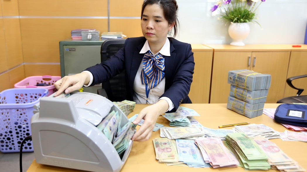 Nhịp điều hành và bước chuyển này vẫn đang tạo được bộ giảm chấn êm, khi bên ngoài thị trường thế giới đang đầy biến động - Ảnh: Quang Phúc.